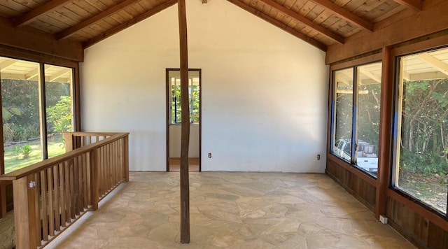 unfurnished sunroom with vaulted ceiling with beams and wood ceiling