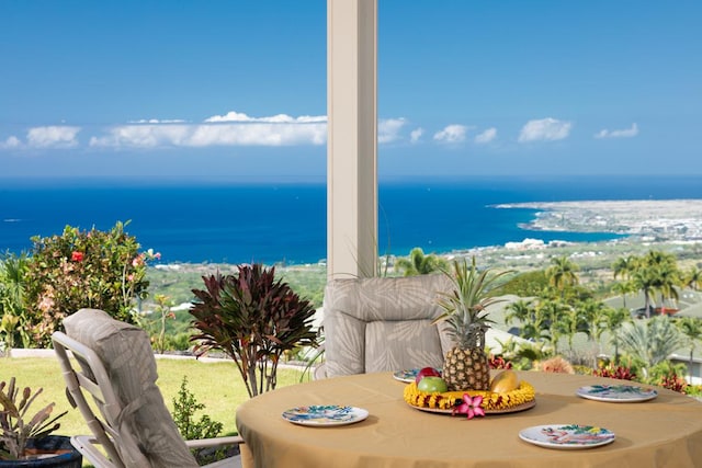 balcony featuring a water view