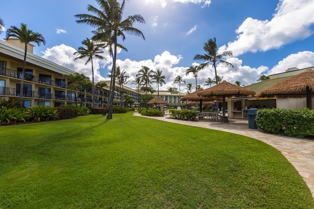 exterior space featuring a lawn and a gazebo