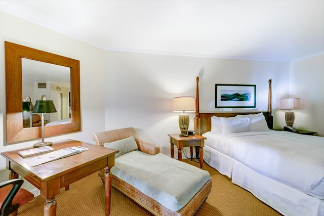 bedroom with carpet and crown molding