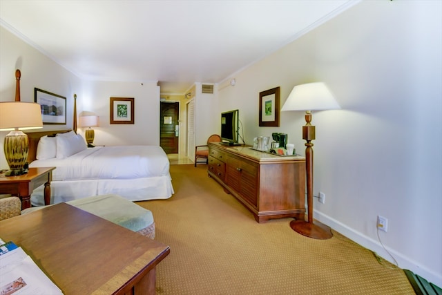 bedroom featuring light carpet and crown molding