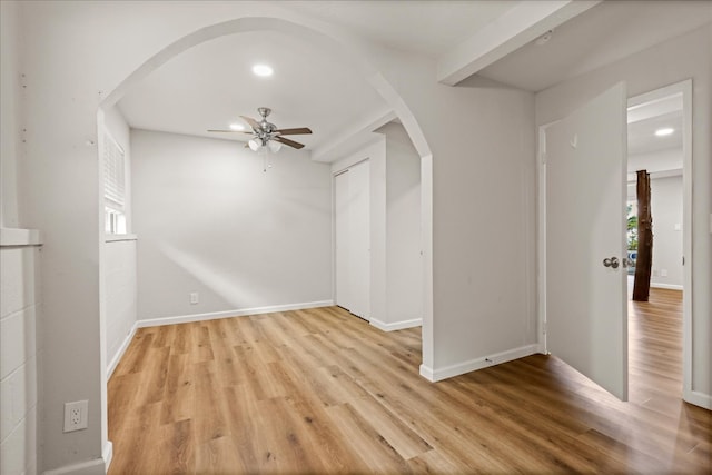 spare room with ceiling fan and light hardwood / wood-style flooring