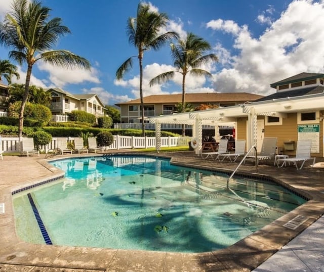 view of swimming pool with a patio area