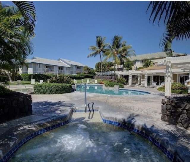 view of swimming pool with a pergola and a patio area