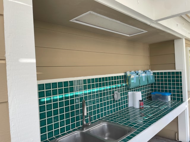 interior details featuring decorative backsplash