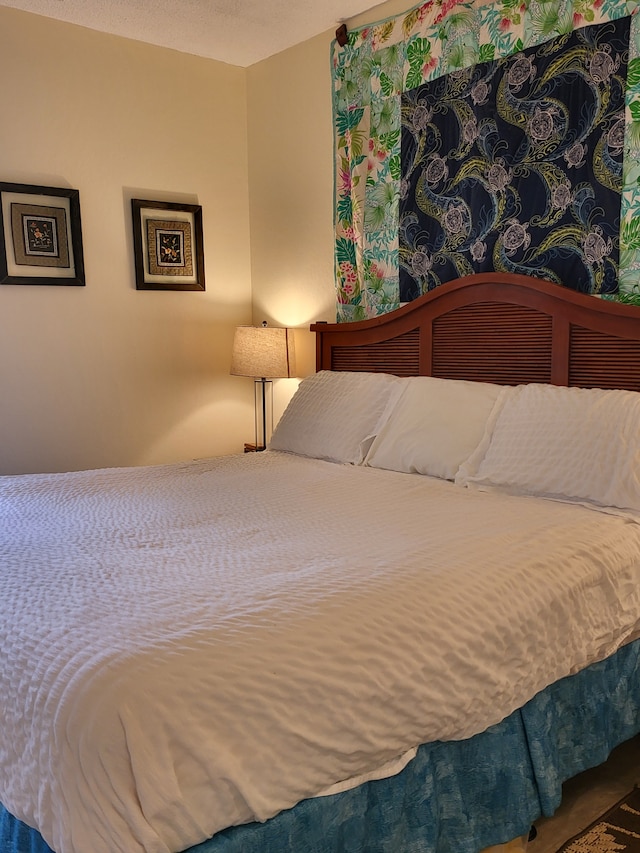 bedroom featuring a textured ceiling