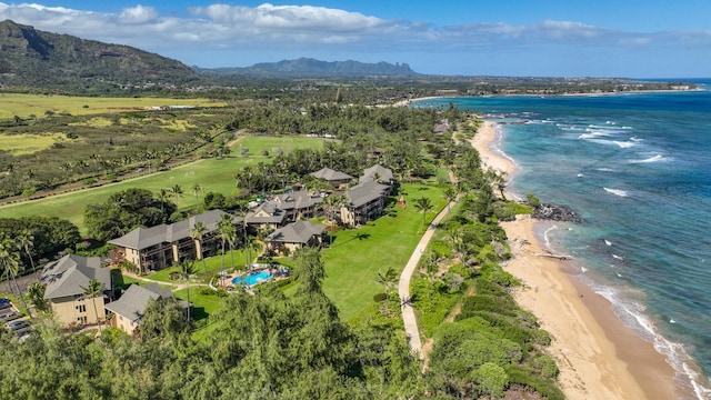 bird's eye view with a view of the beach and a water and mountain view