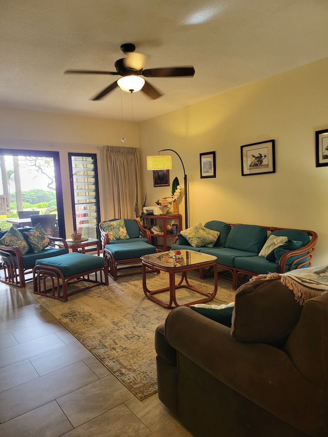 living room with light tile patterned floors and ceiling fan