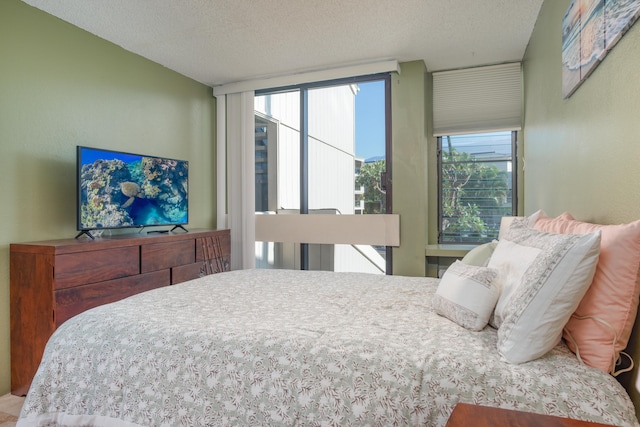 bedroom featuring a textured ceiling