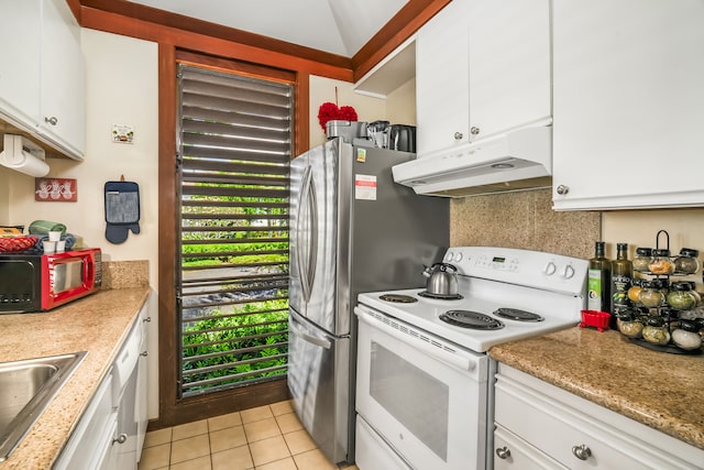 kitchen with white cabinetry, electric range, light tile patterned floors, and light stone counters