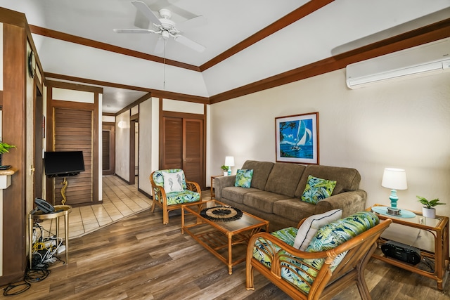 living room featuring ceiling fan, wood-type flooring, a wall unit AC, and vaulted ceiling