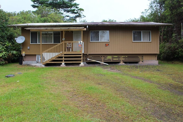 view of front of home with a front yard