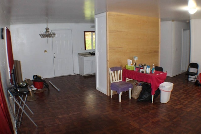 interior space featuring dark parquet flooring