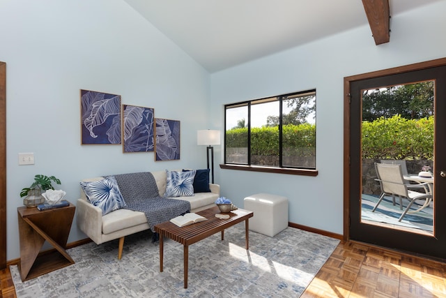 living room with lofted ceiling and parquet flooring