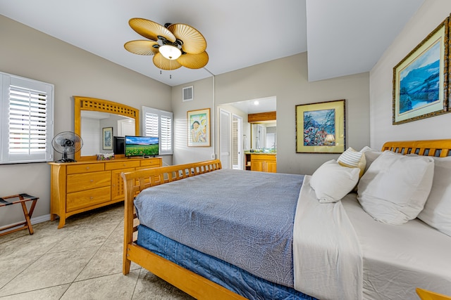 bedroom featuring multiple windows, light tile patterned floors, and ceiling fan