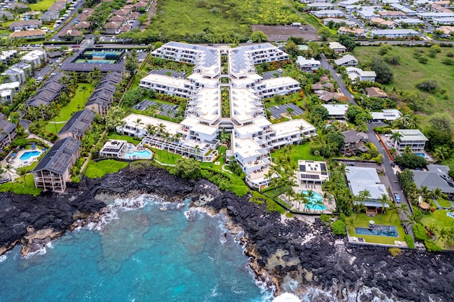 bird's eye view with a water view