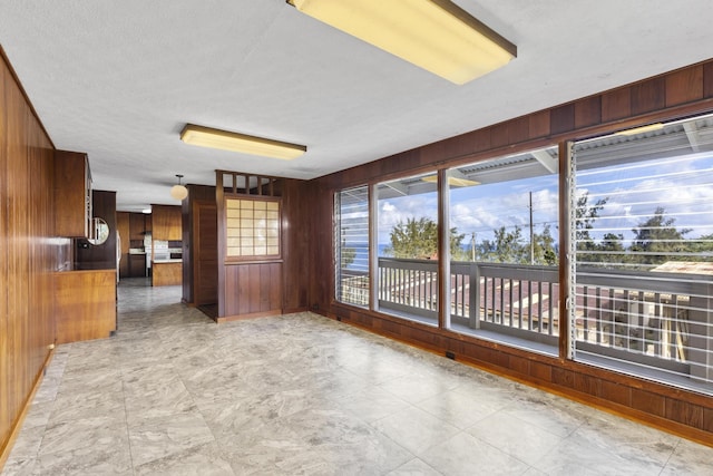 interior space featuring wood walls