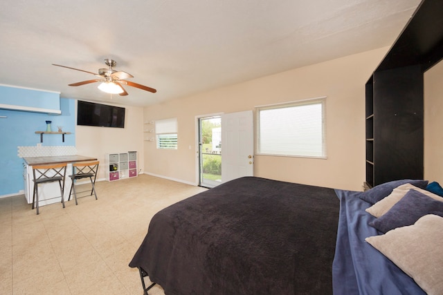 bedroom with ceiling fan and access to outside