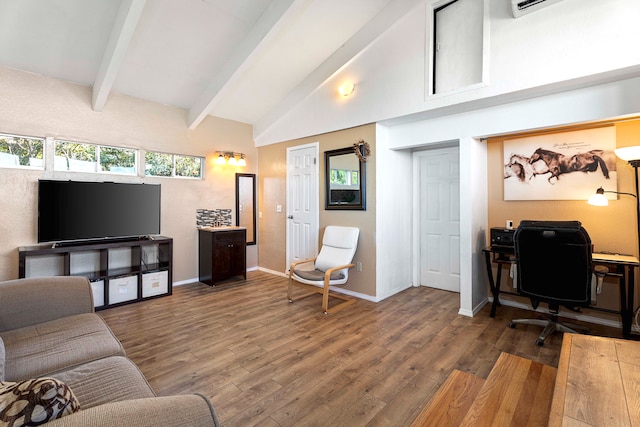 interior space with an AC wall unit, hardwood / wood-style floors, beamed ceiling, and high vaulted ceiling