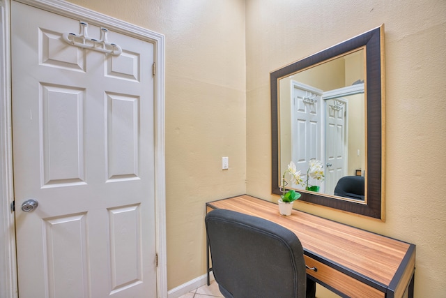 office with light tile patterned floors