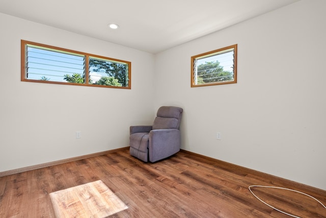 sitting room featuring hardwood / wood-style flooring