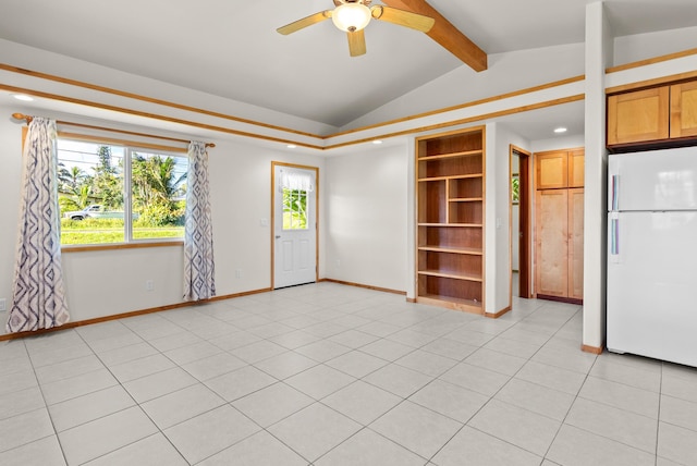 tiled empty room with vaulted ceiling with beams and ceiling fan