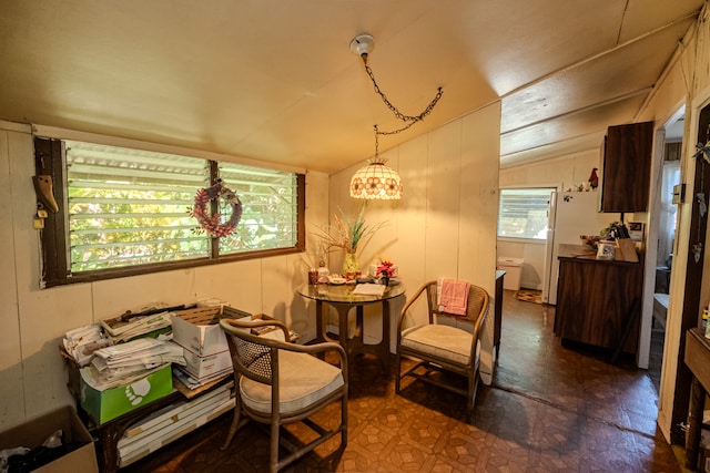 sitting room featuring lofted ceiling