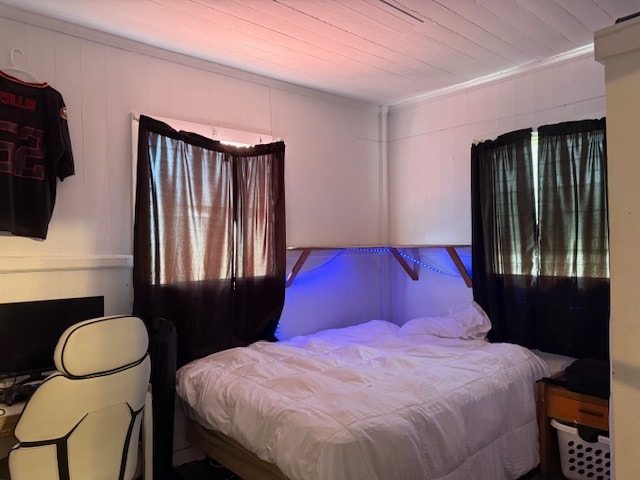 bedroom featuring wooden ceiling