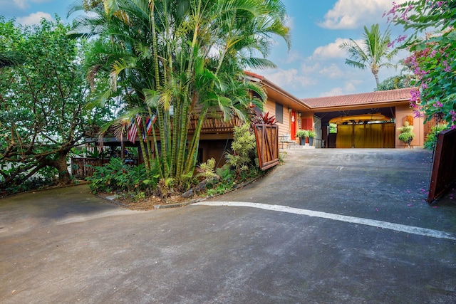 view of front of property with a carport