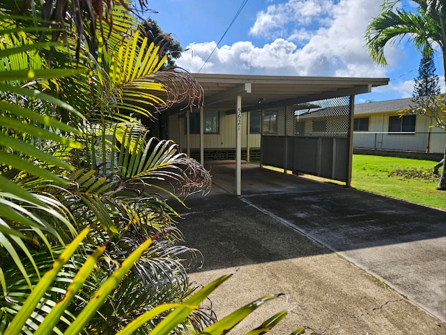 view of car parking featuring a carport