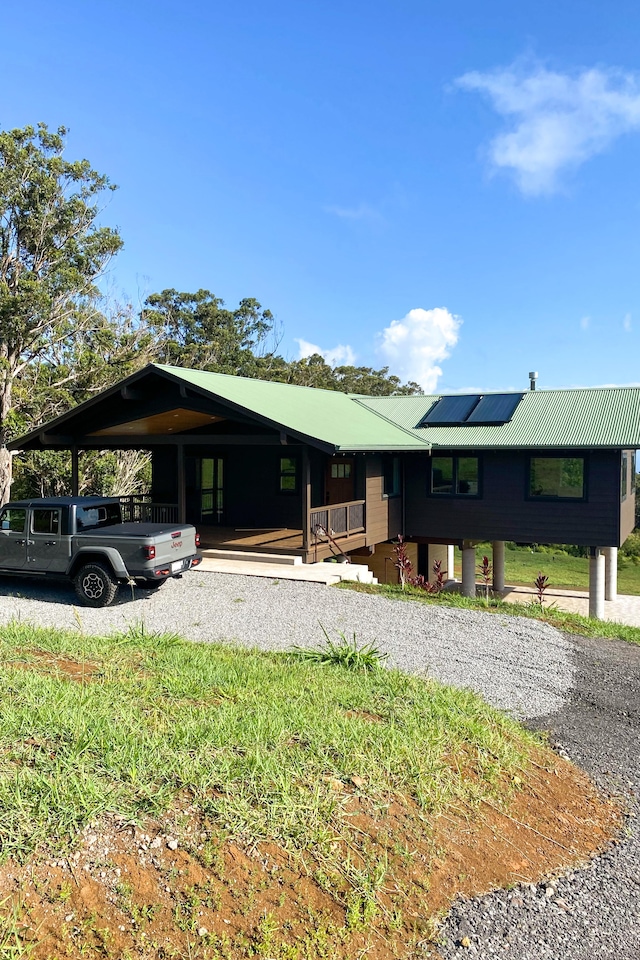 view of front of home with solar panels