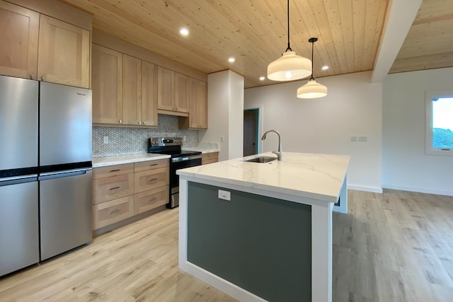 kitchen featuring sink, light brown cabinets, hanging light fixtures, light hardwood / wood-style flooring, and appliances with stainless steel finishes