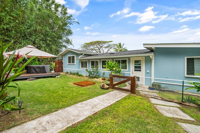 view of front of home featuring a front lawn