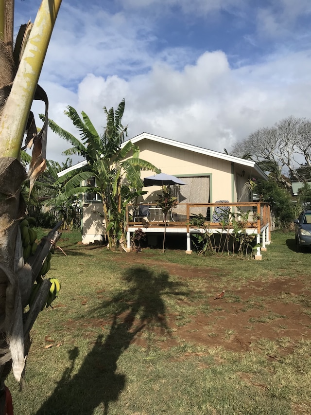 view of yard with a deck