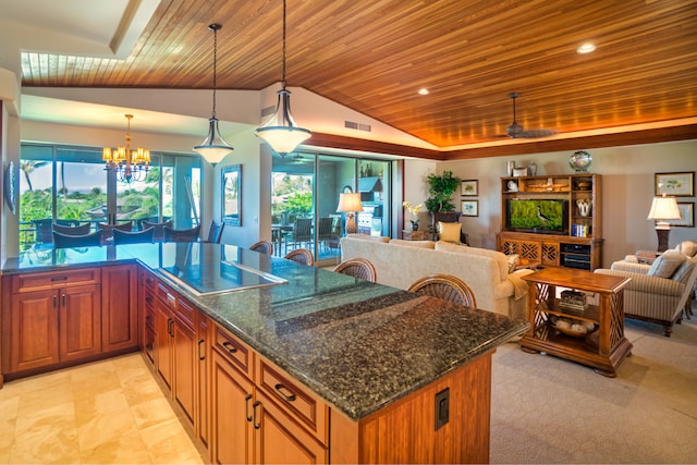 kitchen with ceiling fan with notable chandelier, vaulted ceiling, pendant lighting, wooden ceiling, and dark stone countertops