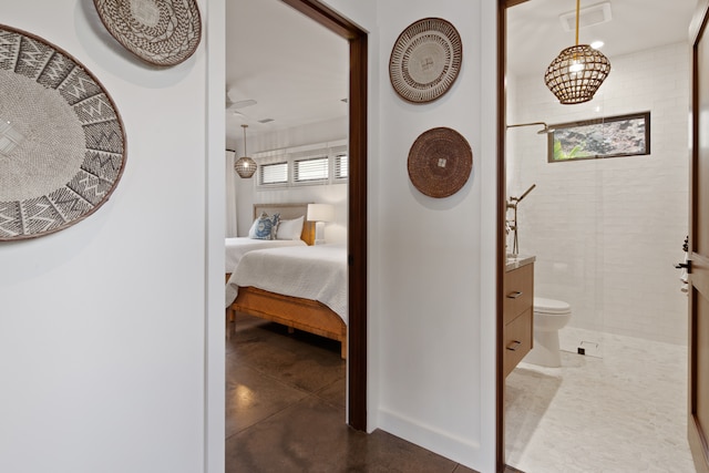 corridor with dark tile patterned flooring