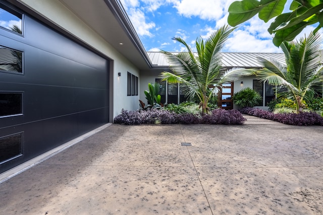 exterior space with a garage