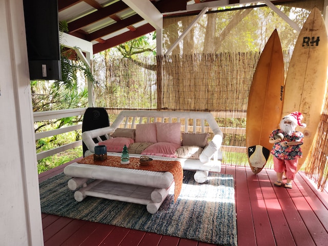 wooden terrace featuring outdoor lounge area