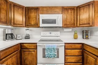 kitchen featuring white appliances