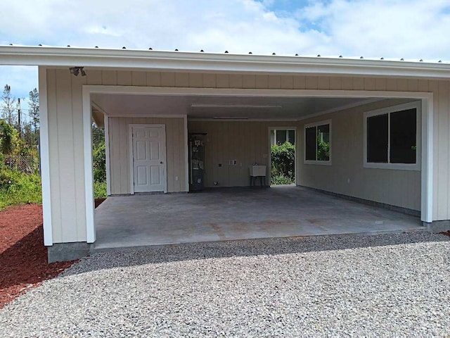 exterior space featuring a carport