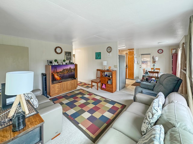 living room with light colored carpet