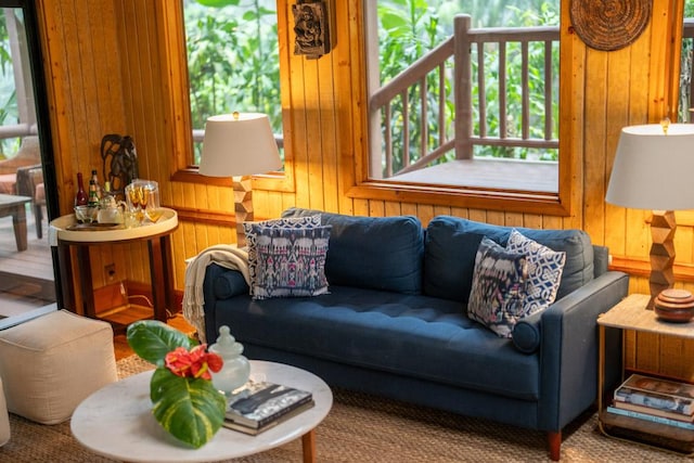 living room featuring wooden walls