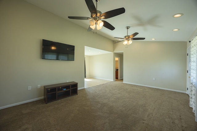 unfurnished living room featuring carpet floors, ceiling fan, and lofted ceiling