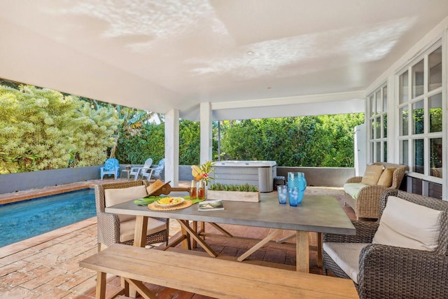 wooden terrace with a patio, an outdoor hangout area, and a pool with hot tub