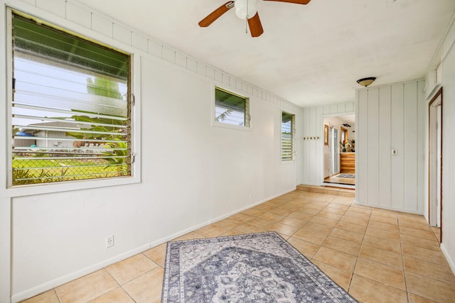 hallway featuring light tile patterned flooring