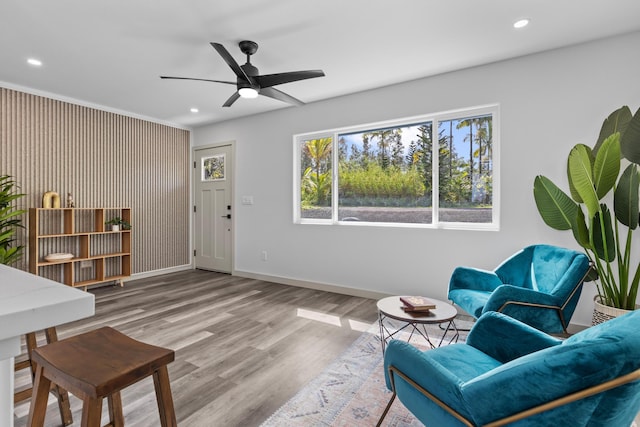 interior space with ceiling fan and light wood-type flooring