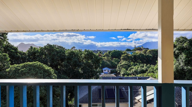 balcony featuring a mountain view