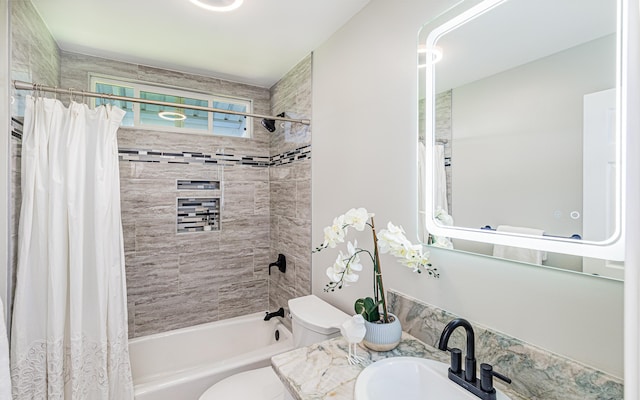 full bathroom featuring shower / bath combination with curtain, toilet, and vanity