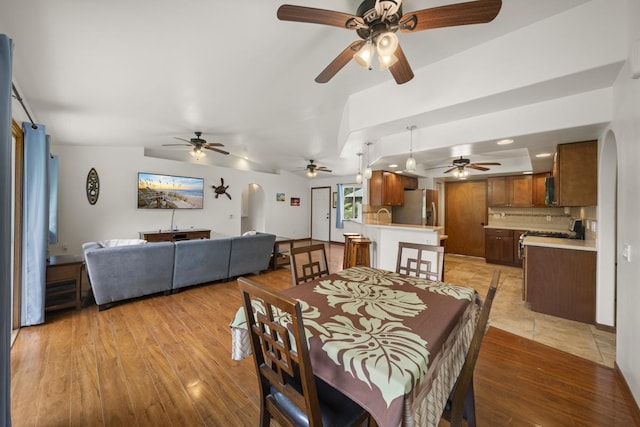 dining room featuring light hardwood / wood-style flooring and sink