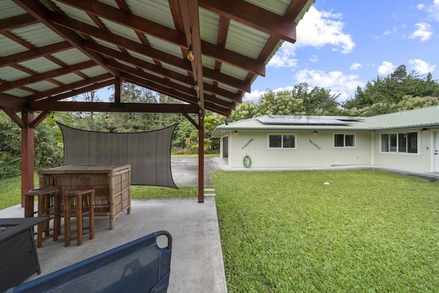 view of yard featuring a gazebo, an outdoor bar, and a patio